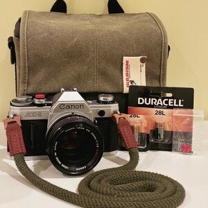 Canon AE-1 35mm Film Camera Kit – FD 50mm f/1.4 Lens + Accessories